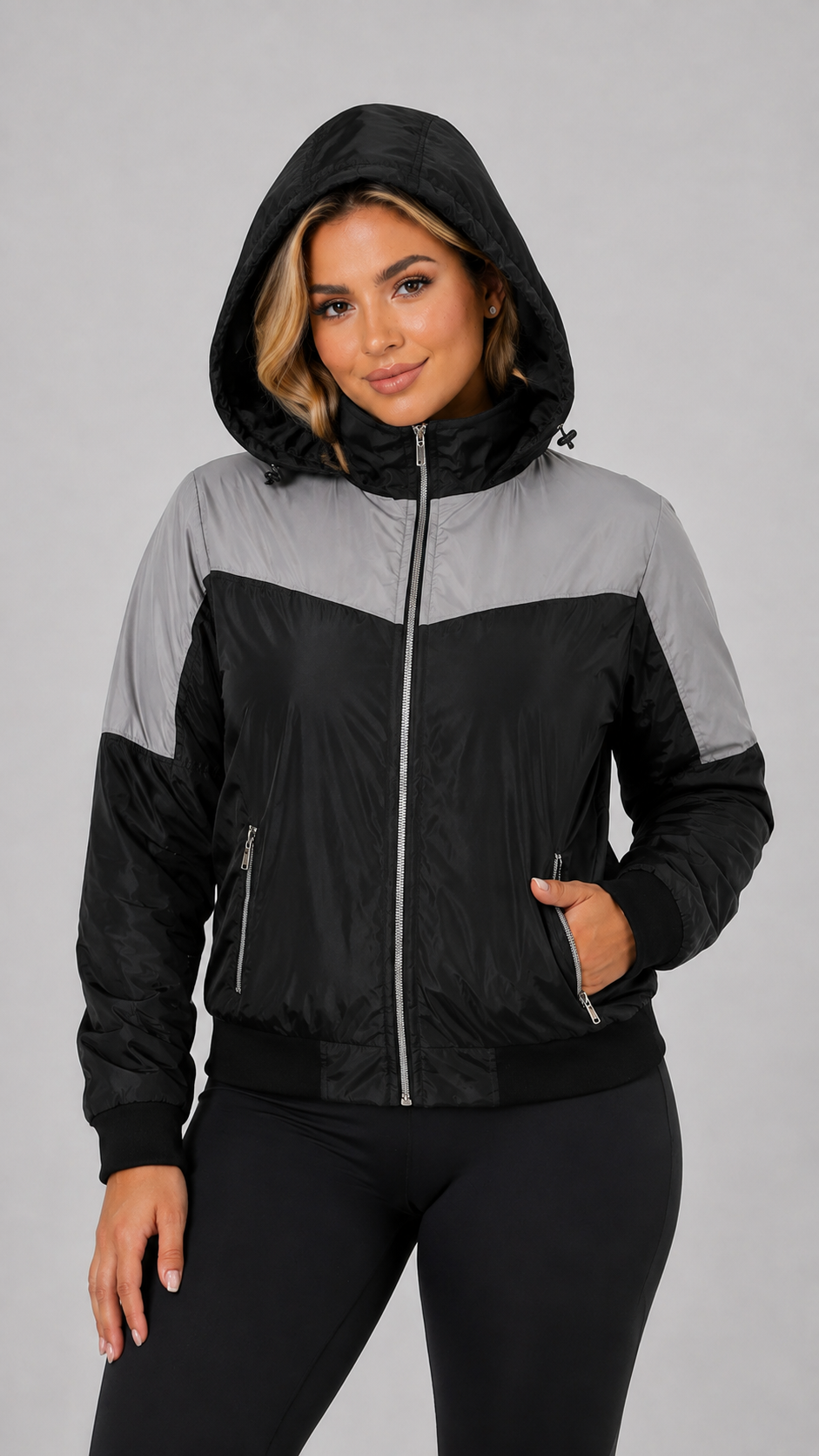 Chaqueta reflectiva de dama con capucha