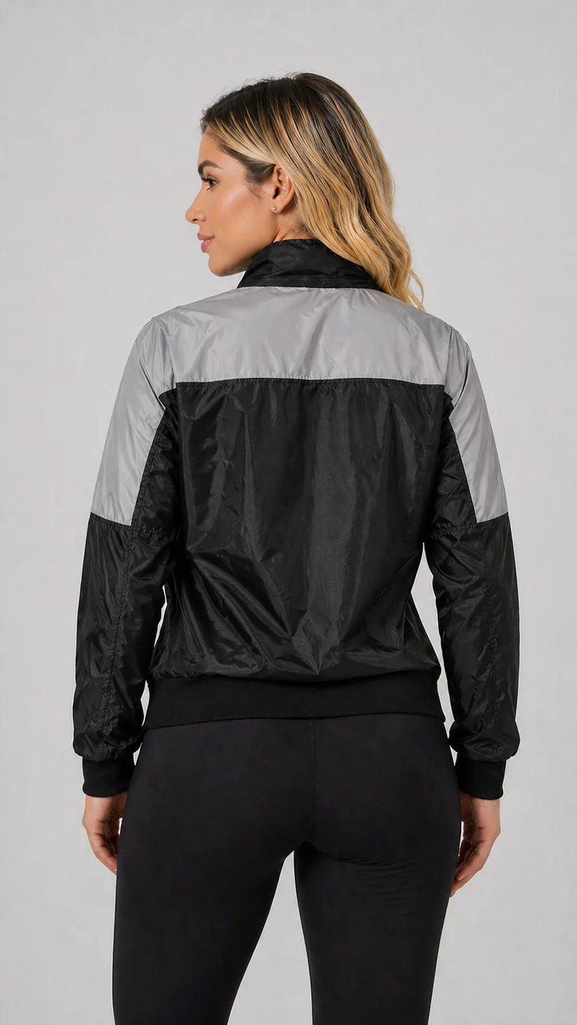 Espalda de la chaqueta reflectiva de dama